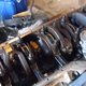 Underneath the oil pan, the crankshaft is easily visible.